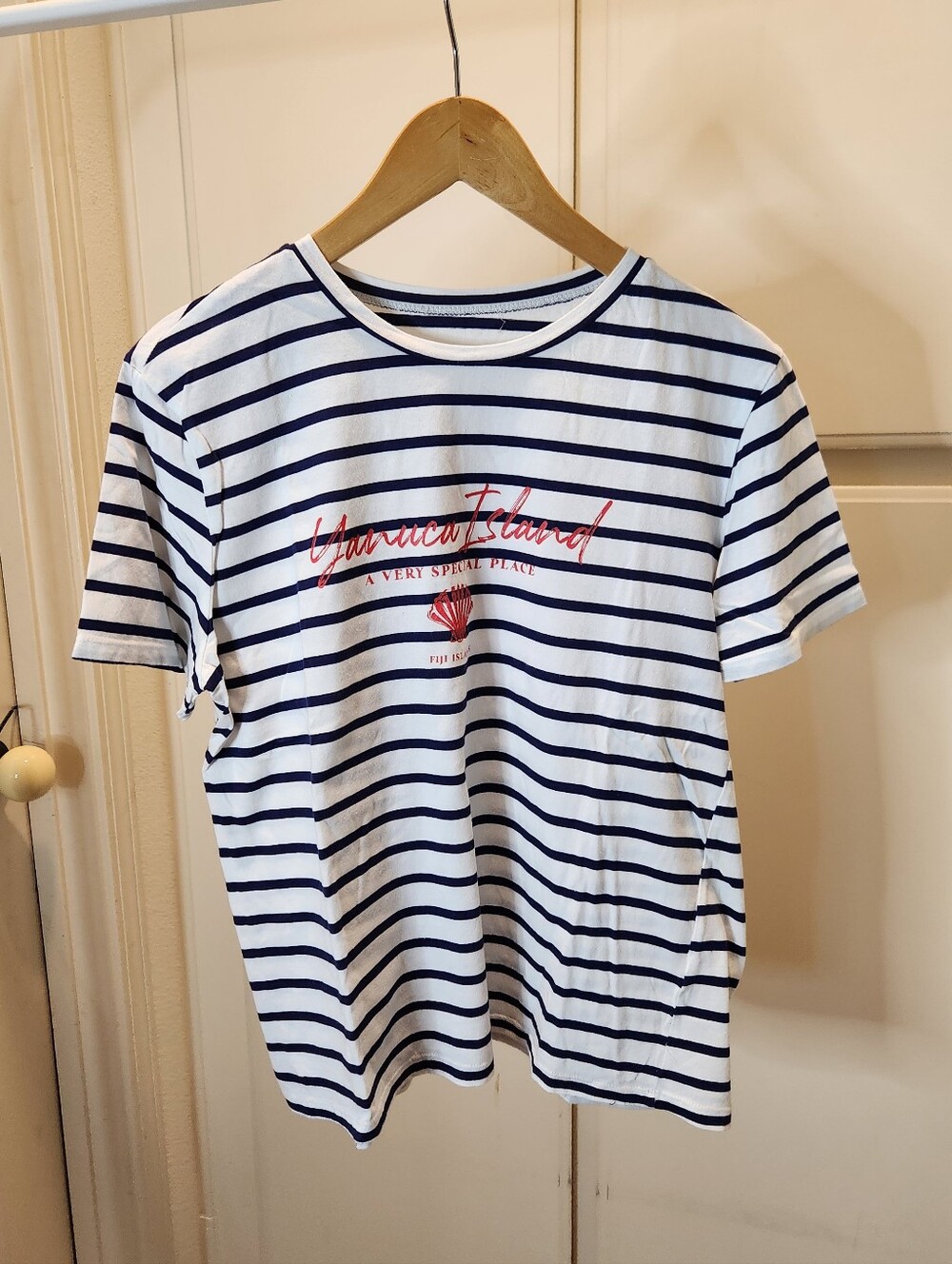 Blue and white stripe tshirt with red lettering